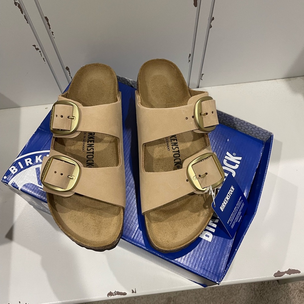 Birkenstock Cream Sandals with Two-Strap Design and Contoured Footbed
